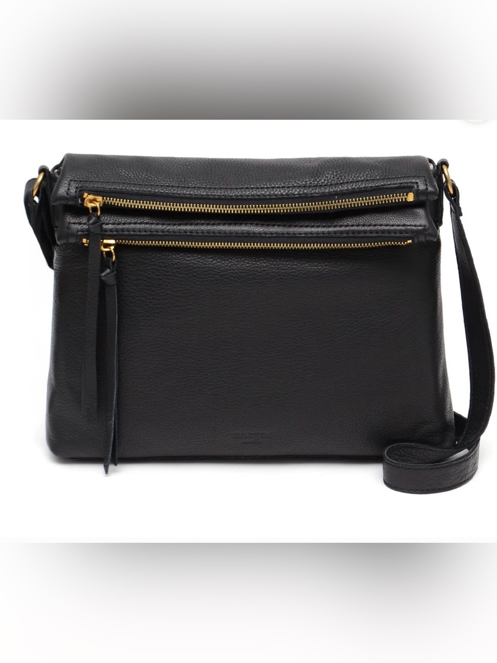 Margot New York Mickey fold-over crossbody bag in black leather.